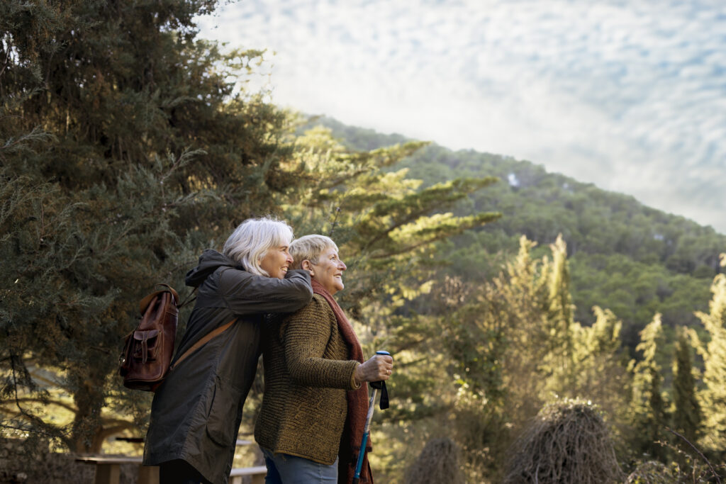 two-senior-women-enjoying-hike-nature
